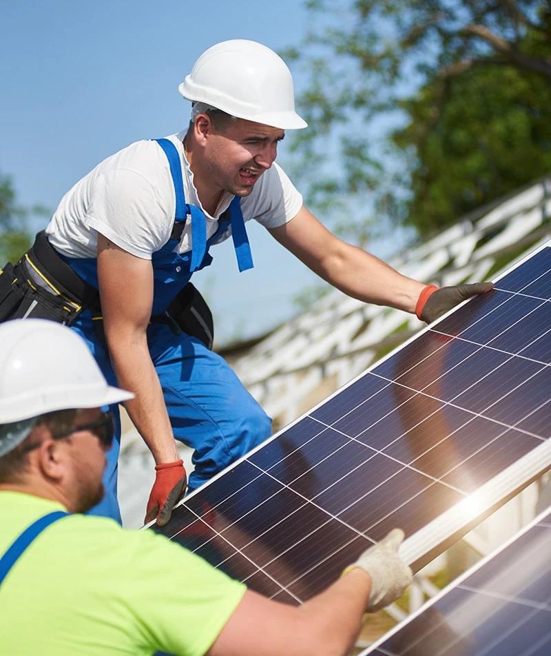 Solar worker installing panel